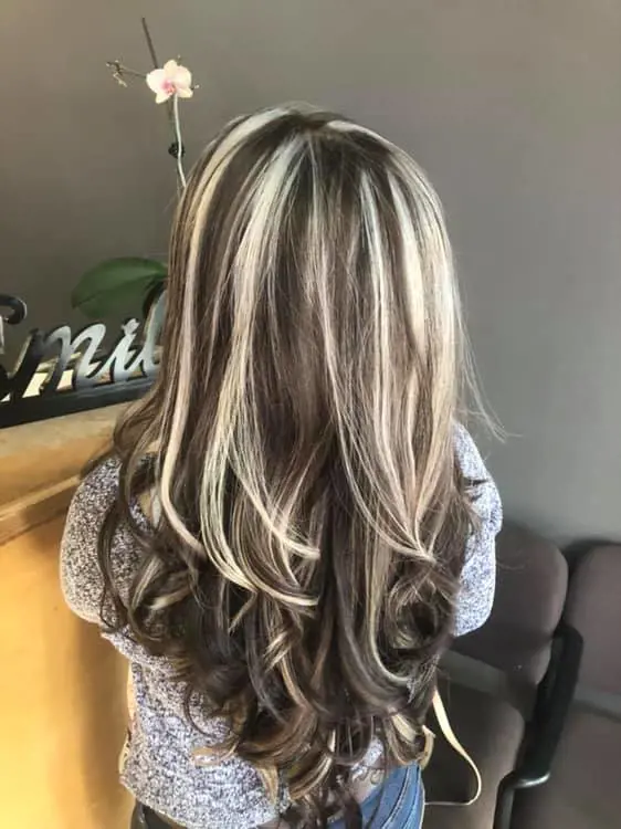 Super subtle platinum highlights provide intense dimension to dark chocolate brown hair