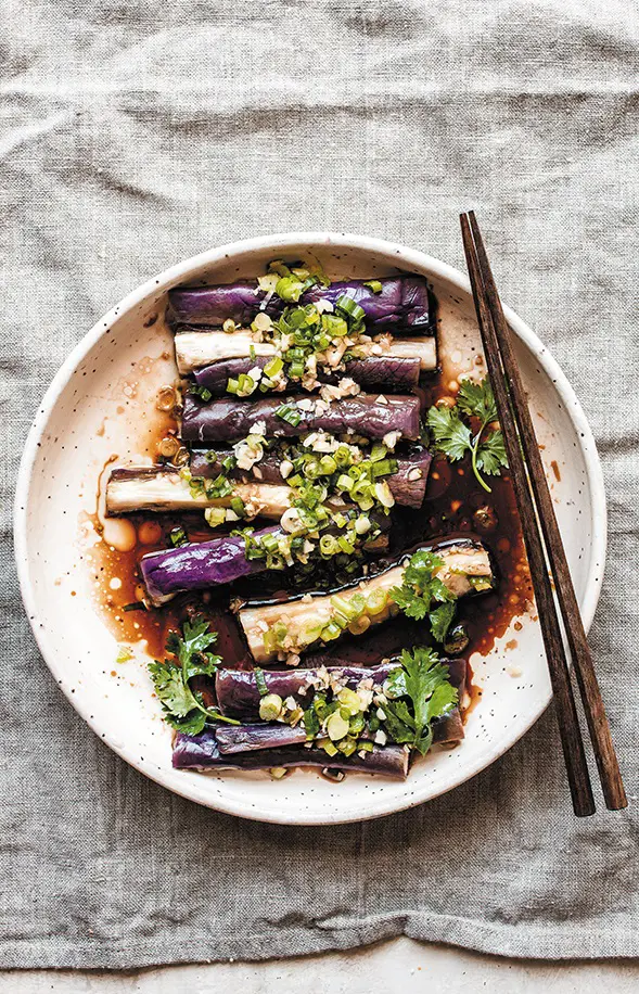 This delicious seasoned steamed eggplant prepared by PureWow can served with pasta or rice