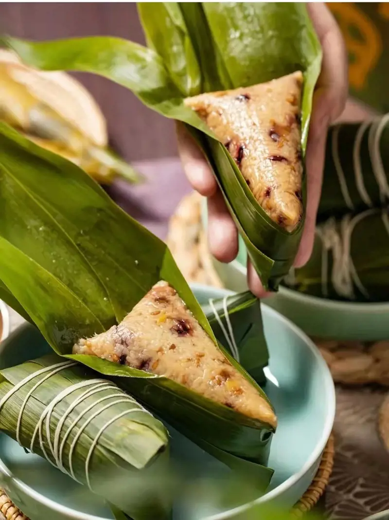 During the Dragon Boat Festival, Chinese people think most of the sticky rice dumplings, Zongzi.